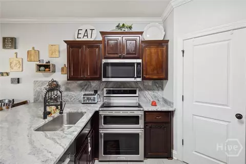 Kitchen - 119 Stadium Dr, Guyton, GA 31312 photo 5 of 5