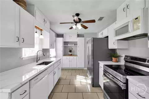Kitchen - 313 Hickory St, Springfield, GA 31329 photo 2 of 3