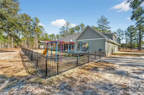 Exterior - 323 Edgewood Rd, Guyton, GA 31312 photo 11 of 12