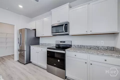 Kitchen - 105 Windrush Pines Pnes, Pooler, GA 31322 photo 3 of 5