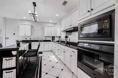 Kitchen - 100 Cypress Dr, Rincon, GA 31326 photo 2 of 5