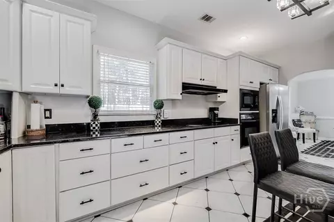 Kitchen - 100 Cypress Dr, Rincon, GA 31326 photo 3 of 5