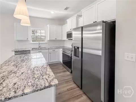 Kitchen - 825 Buckhead Loop SE, Allenhurst, GA 31301 photo 3 of 3