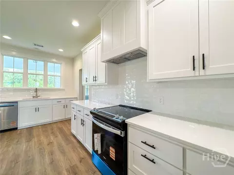 Kitchen - 648 Stone Ct, Midway, GA 31313 photo 3 of 5