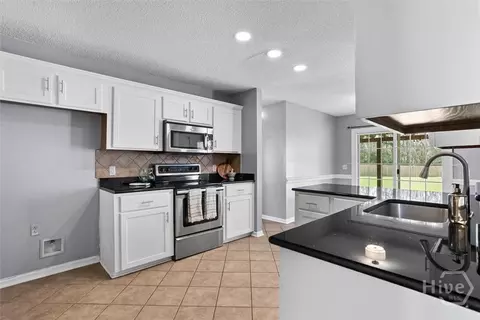Kitchen - 135 Raindance Rd, Pooler, GA 31322 photo 4 of 4
