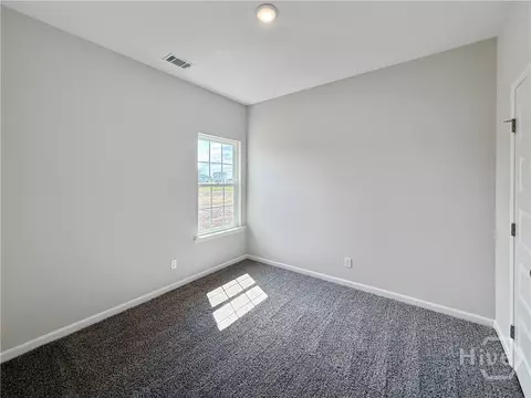 Bedroom - 493 Buckhead Loop SE, Allenhurst, GA 31301 photo 3 of 4