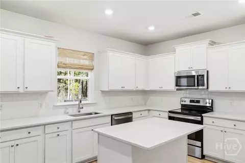 Kitchen - 136 Binscombe Ln, Pooler, GA 31322 photo 2 of 3