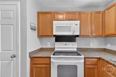 Kitchen - 102 Sand Pine Ct, Springfield, GA 31329 photo 3 of 4
