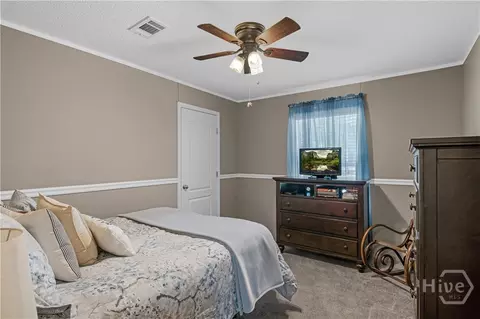 Bedroom - 560 Brogdon Rd, Guyton, GA 31312 photo 3 of 4