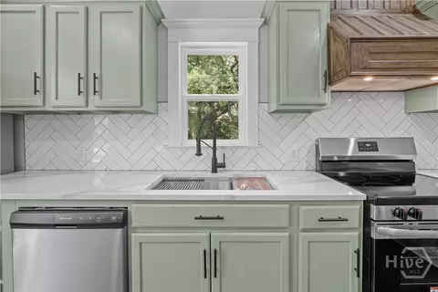 Kitchen - 674 Dunlevie Rd, Allenhurst, GA 31301 photo 2 of 5