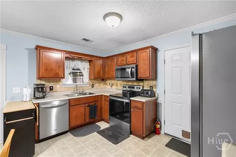 Kitchen - 8 Mitchell Dr, Rincon, GA 31326 photo 3 of 4
