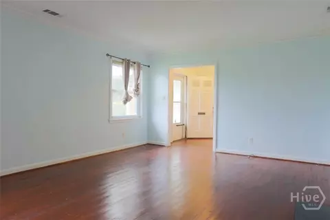 Living - 211 E 63rd St, Savannah, GA 31405 photo 1 of 5