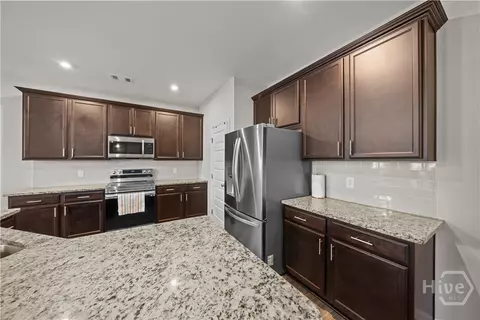 Kitchen - 209 Alyssa Ave, Guyton, GA 31312 photo 3 of 7
