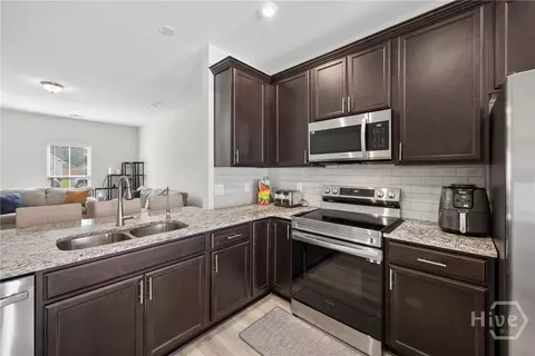 Kitchen - 207 Alyssa Ave, Guyton, GA 31312 photo 3 of 4