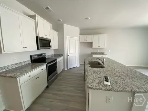 Kitchen - 116 Windrush Pnes, Pooler, GA 31322 photo 2 of 5