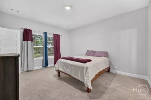 Bedroom - 329 Crosswinds Dr, Rincon, GA 31326 photo 1 of 7