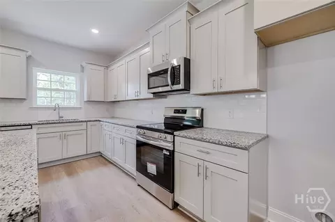 Kitchen - 1371 Ebenezer Rd, Rincon, GA 31326 photo 3 of 7