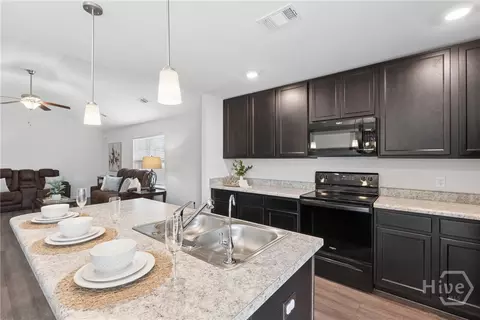 Kitchen - 107 Dasher Dr, Springfield, GA 31329 photo 2 of 3