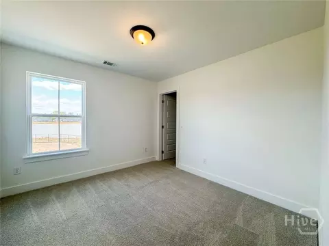 Bedroom - 151 Cottage Loop, Midway, GA 31320 photo 3 of 4