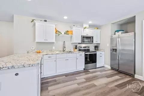 Kitchen - 305 E Fourth St, Springfield, GA 31329 photo 2 of 3