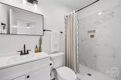 Bath - 562 4th Ext, Guyton, GA 31312 photo 1 of 2