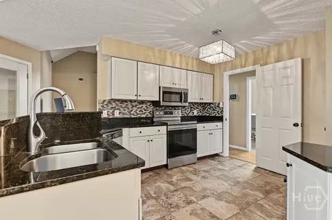 Kitchen - 117 Quiet Pine Cir, Pooler, GA 31322 photo 2 of 5