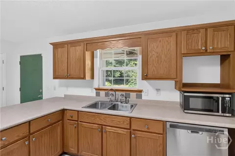 Kitchen - 504 Lake Dr, Midway, GA 31320 photo 2 of 3