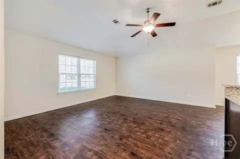 Living - 117 S 3rd St, Guyton, GA 31312 photo 1 of 5