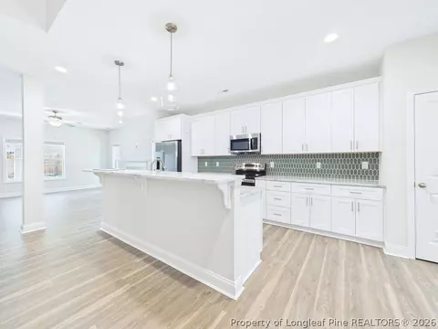 Kitchen - 816 Red Hawk Pl, Vass, NC 28394 photo 3 of 5