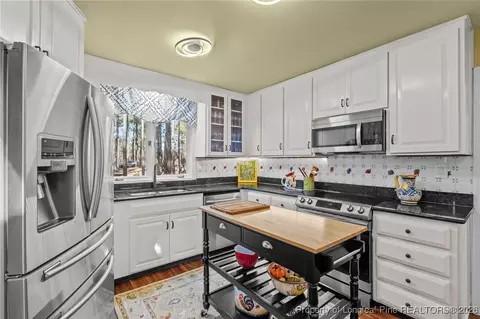 Kitchen - 15740 Fox Ln, Wagram, NC 28396 photo 2 of 3