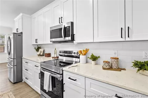 Kitchen - 712 Bald Eagle Dr, Vass, NC 28394 photo 3 of 4