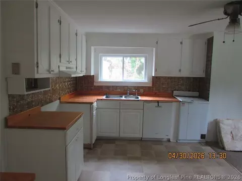 Kitchen - 215 E Maple St, Mount Olive, NC 28365 photo 1 of 1