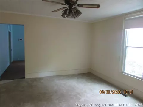 Living - 215 E Maple St, Mount Olive, NC 28365 photo 2 of 3