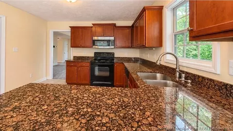 Kitchen - 415 Regimental Dr, Cameron, NC 28326 photo 2 of 2