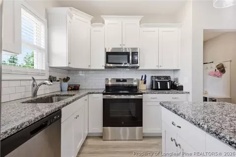 Kitchen - 708 Walker Rd, Bunnlevel, NC 28323 photo 3 of 3