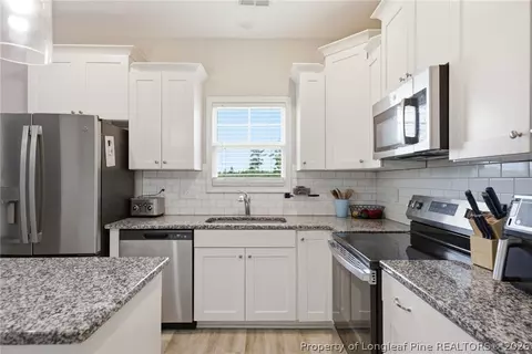 Kitchen - 708 Walker Rd, Bunnlevel, NC 28323 photo 2 of 3