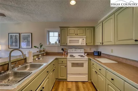 Kitchen - 1355 Seven Devils Rd #302, Seven Devils, NC 28604 photo 1 of 3
