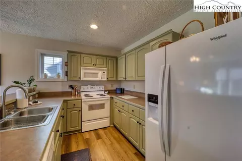 Kitchen - 1355 Seven Devils Rd #302, Seven Devils, NC 28604 photo 2 of 3