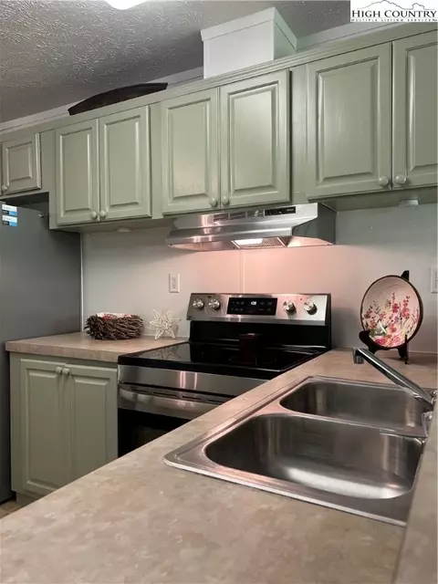 Kitchen - 905 Lyons Rd, Roaring Gap, NC 28668 photo 5 of 6