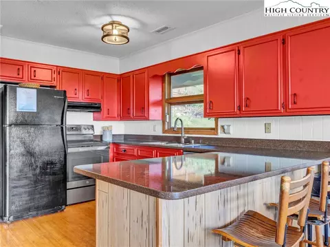 Kitchen - 166 Knob Hill Ln, Seven Devils, NC 28604 photo 2 of 2