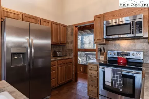 Kitchen - 107 Buckshot Ridge Rd, Deep Gap, NC 28618 photo 2 of 2