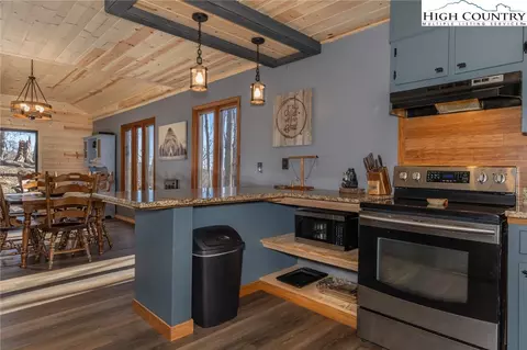 Kitchen - 468 E Horse Shoe Ridge Rd, Deep Gap, NC 28618 photo 2 of 4