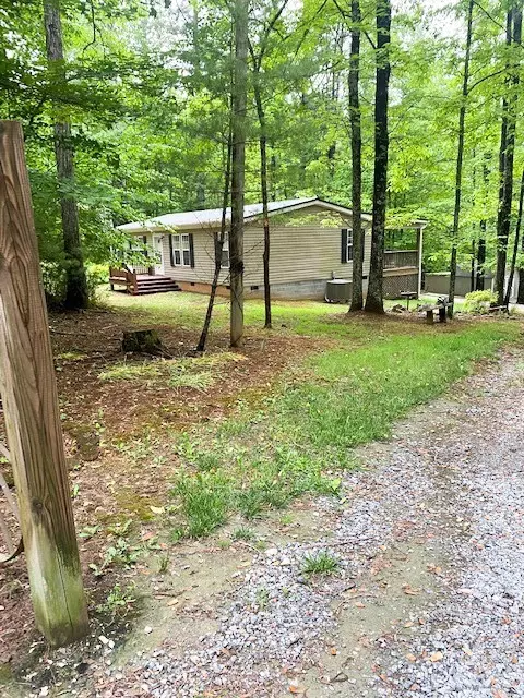 Exterior - 1027 White Pine Dr, Ennice, NC 28623 photo 12 of 15