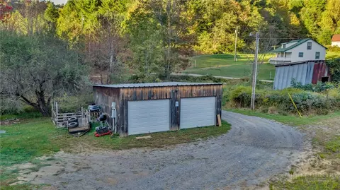 Exterior - 2832 Roaring Fork Rd, Creston, NC 28615 photo 13 of 15