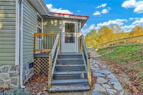 Exterior - 2832 Roaring Fork Rd, Creston, NC 28615 photo 11 of 15