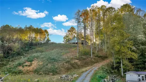 Exterior - 2832 Roaring Fork Rd, Creston, NC 28615 photo 3 of 15