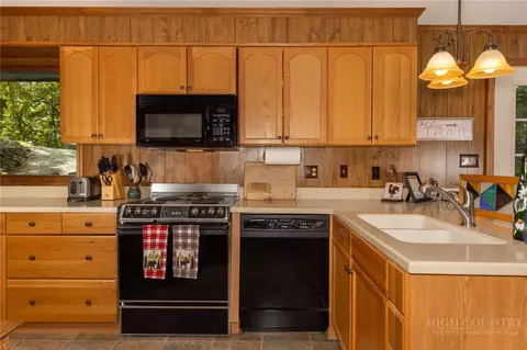Kitchen - 329 Deer Run Rd, Deep Gap, NC 28618 photo 4 of 7