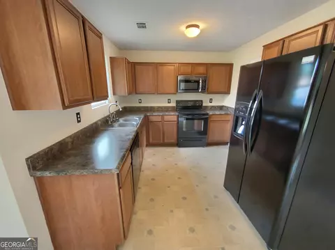 4937 Summersun Dr, Morrow, GA 30260 photo 6