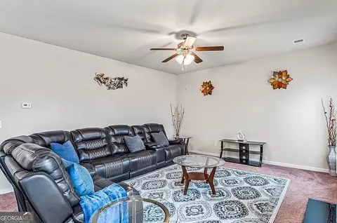 Living - 581 Caledon Way, Hampton, GA 30228 photo 4 of 6