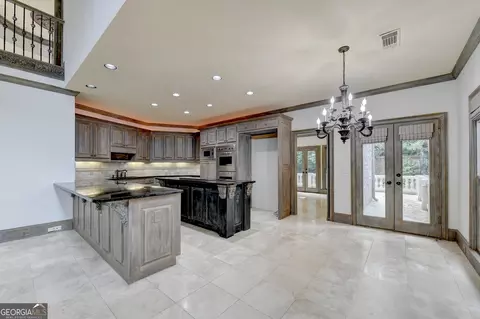 Kitchen - 8385 Royal Melbourne Way, Duluth, GA 30097 photo 1 of 10
